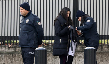 Policemen search a woman in Ankara, Türkiye. (AFP file photo)