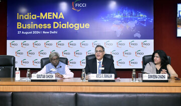 Aseem R. Mahajan (C), joint secretary for the Gulf at the Ministry of External Affairs, speaks during a business dialogue.