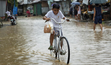 Storm sets off floods and landslides in Philippines, leaving at least 9 dead