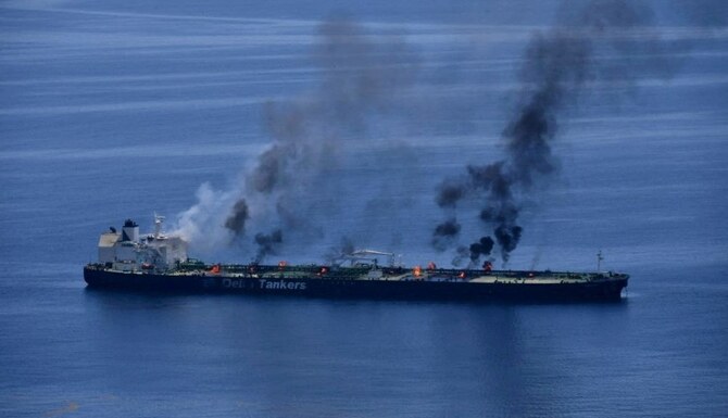 Burning oil tanker drifting but still afloat, British maritime agency says