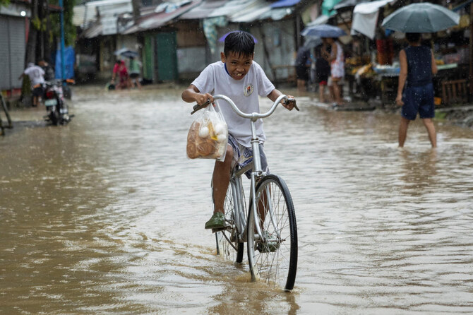 Storm sets off floods and landslides in Philippines, leaving at least 9 dead