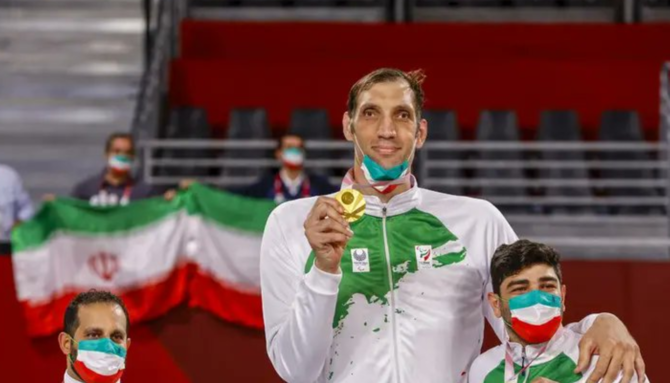 Iranian 2.46m para volleyballer struggles to find bed big enough