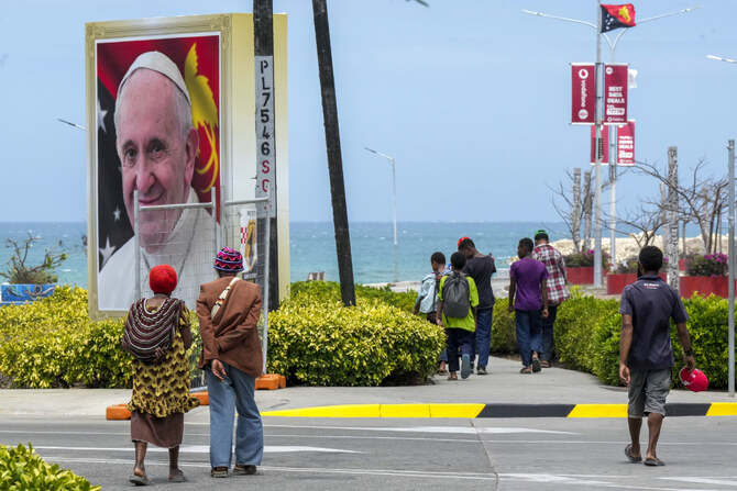 Pope heads to Papua New Guinea after final Mass in Indonesia before an overflow crowd of 100,000